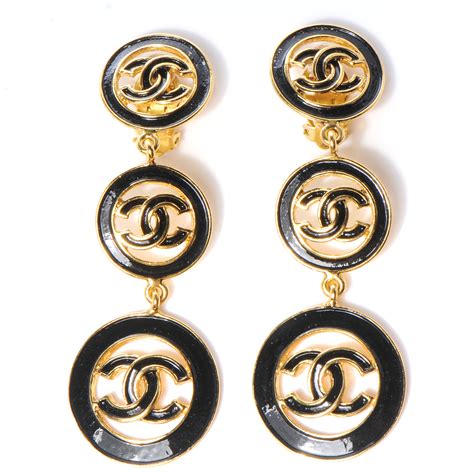 black and gold chanel earrings.